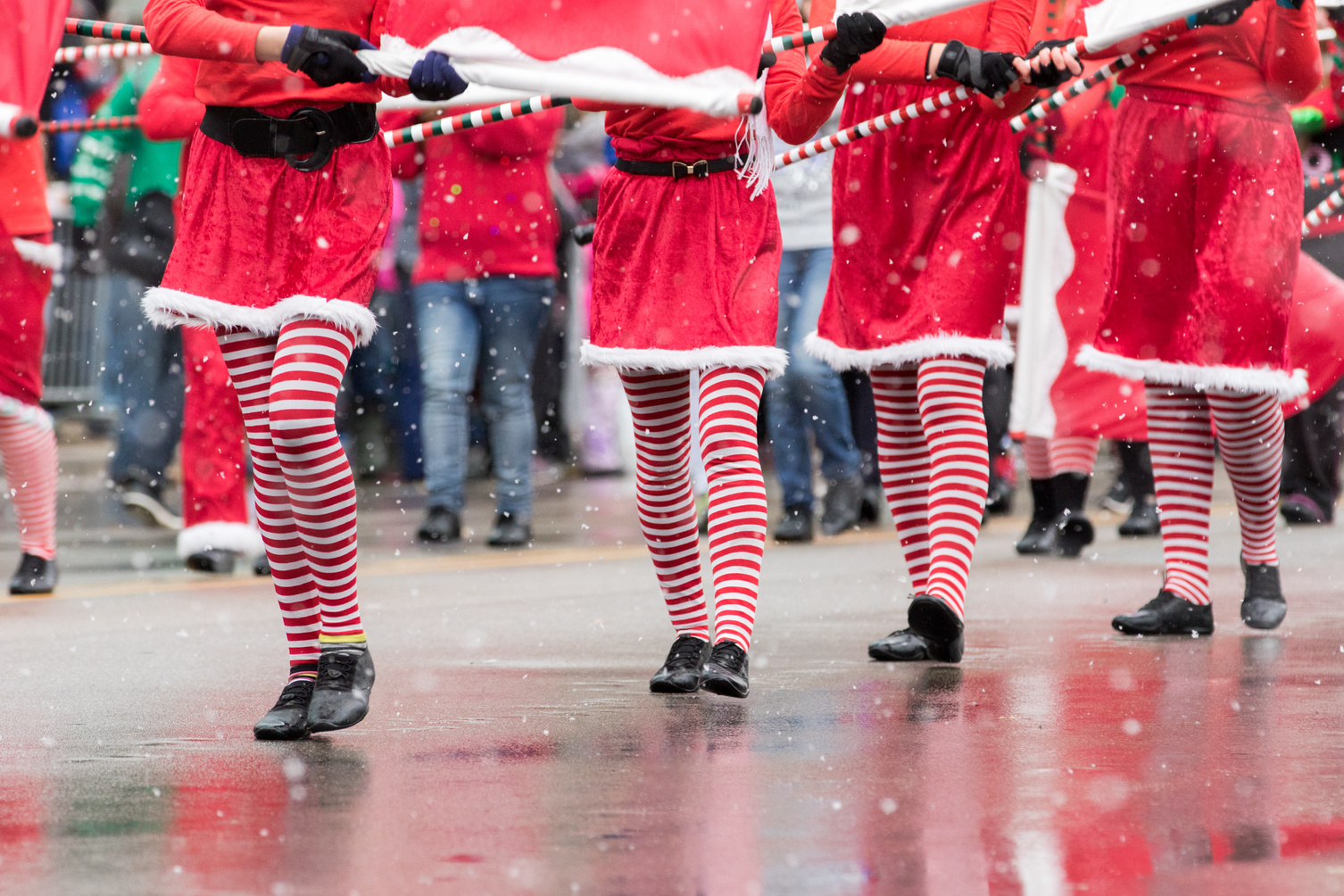 Marchers in a Santa holiday parade