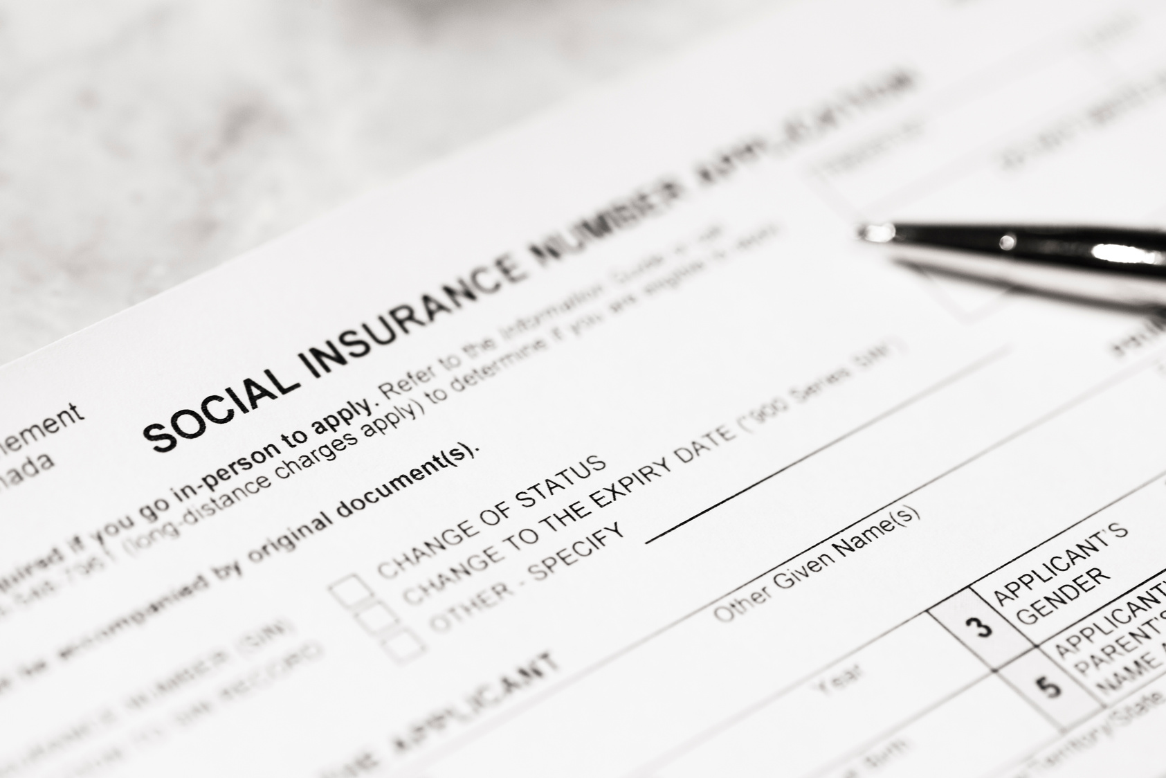 Social Insurance Number Application Form with Pen