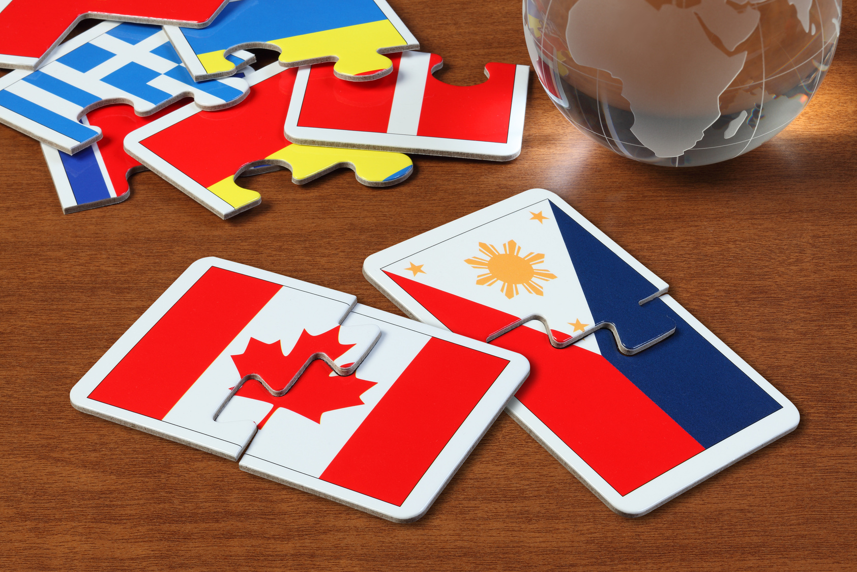 Canada and Philippines Flags in puzzle